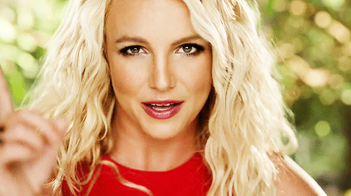 Artiesten Britney spears Gifs glimlachen muziekvideo hair flip oops popster 