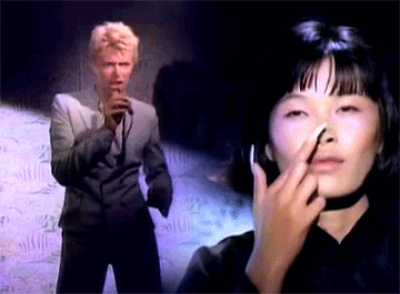 Beroemdheden Artiesten Gifs David bowie &amp;#39;80 mick jagger dansen in de straat 