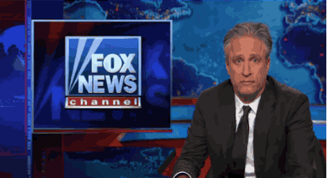 Jon Stewart GIF. Gifs Filmsterren Jon stewart Geamuseerd Popcorn 