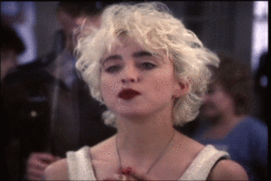 Madonna GIF. Artiesten Madonna Gifs Het zingen Hair flip 